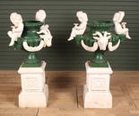Pair Cast Iron Putti Handle Urns on Bases
