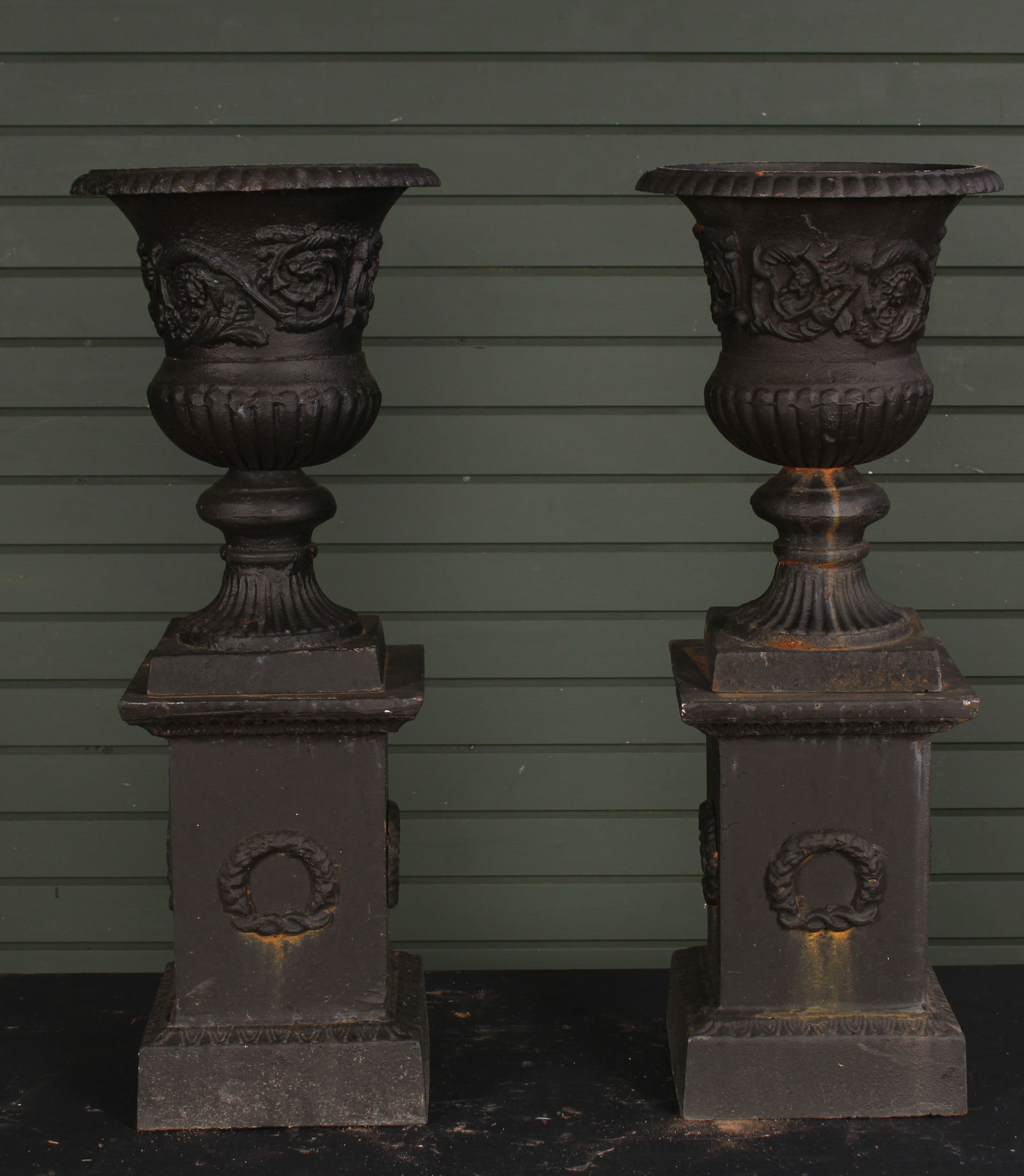 Pair Cast Iron Stanchion Top Entryway Urns: Pair Cast Iron Stanchion Top Entryway UrnsSize: overall 27"H 10.5"Dia. on 8"W x 8"D base
