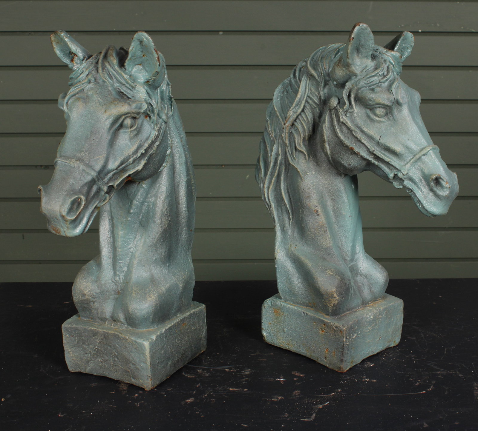 Pair Figural Cast Iron Horse Heads: Pair Figural Cast Iron Horse Heads. Perfect for stanchion finials at a stately entryway. Size: 6.5"H x 5"W x 11"D