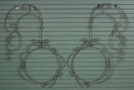 2 Architectural Iron Rotating Trade Sign Bezels: 2 Architectural Wrought Iron Rotating Sign Bezels. Size: 28"H overall, 23.5" Dia. Frame