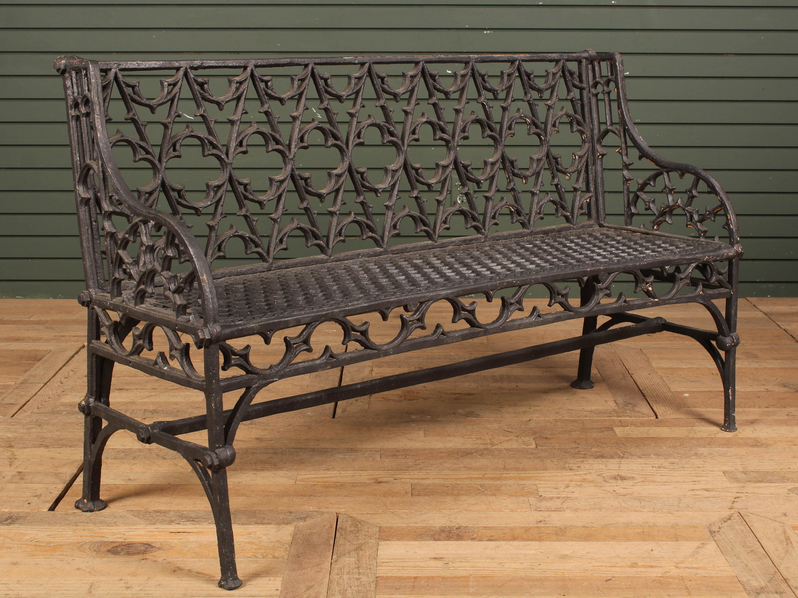 Gothic Style Cast Iron Bench, Garden Seating: Cast iron painted gothic style garden bench with quatrefoil and tracery motifs. Size: 34"T x 55.5"L x 21"D
