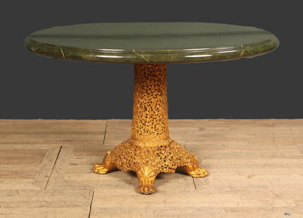 Anglo Indian Pedestal Table, Paw Feet: Ornate carved wood pedestal table with lion paw feet & faux painted green marble top. Size would function as a dining table or central entry way table. Size: 30"H x 50" Dia.
