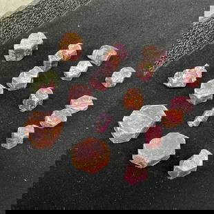 Uncut Natural Rubies, Lapidary Use: A selection of uncut natural rubies, 17 pieces in all. Size: various 7.9mm-25mm across, total weight 123.2g, 615 carat Provenance: From the lifetime collection of an Oreland, Pennsylvania private esta