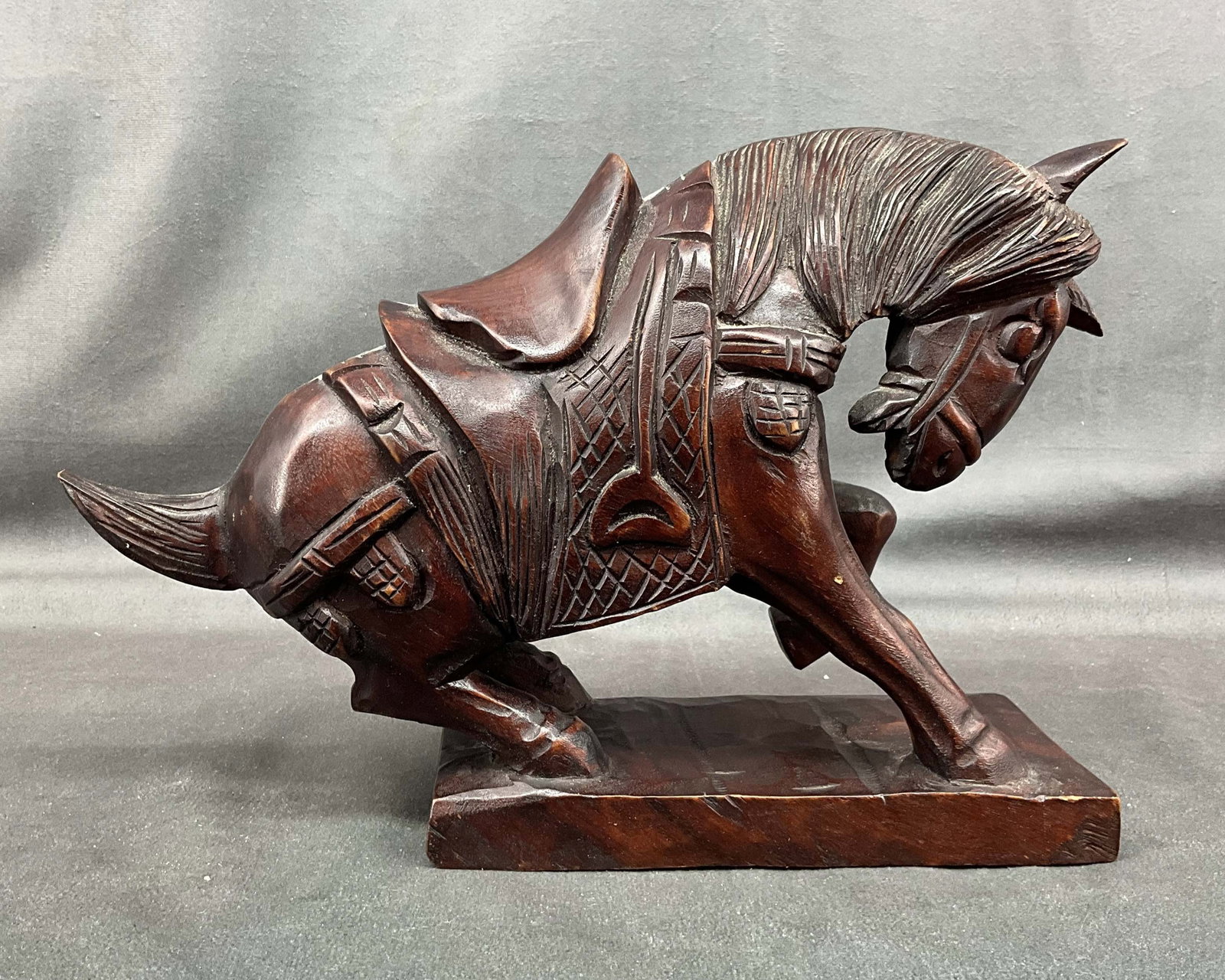 Carved Wood Horse: Asian style full body carved wood horse. not signed. Size: 8.25"T x 12"L x 3.5"D Provenance: From the lifetime collection of an Oreland, Pennsylvania private estate.