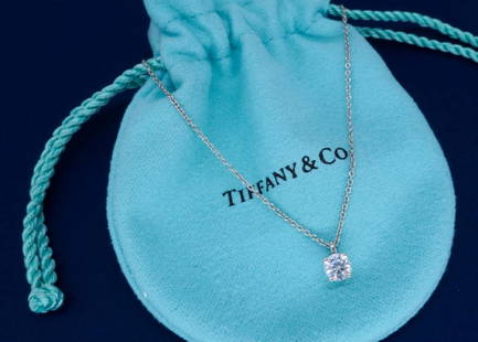 Tiffany & Co Platinum 0.45ct Diamond Pendant with Chain: One Tiffany & Co Platinum 0.45ct Diamond Pendant with Chain. (1) Round Diamond with a total weight of 0.45cts with a color of F and clarity of VVS-1. Total length of this chain is 16 inches. Total wei