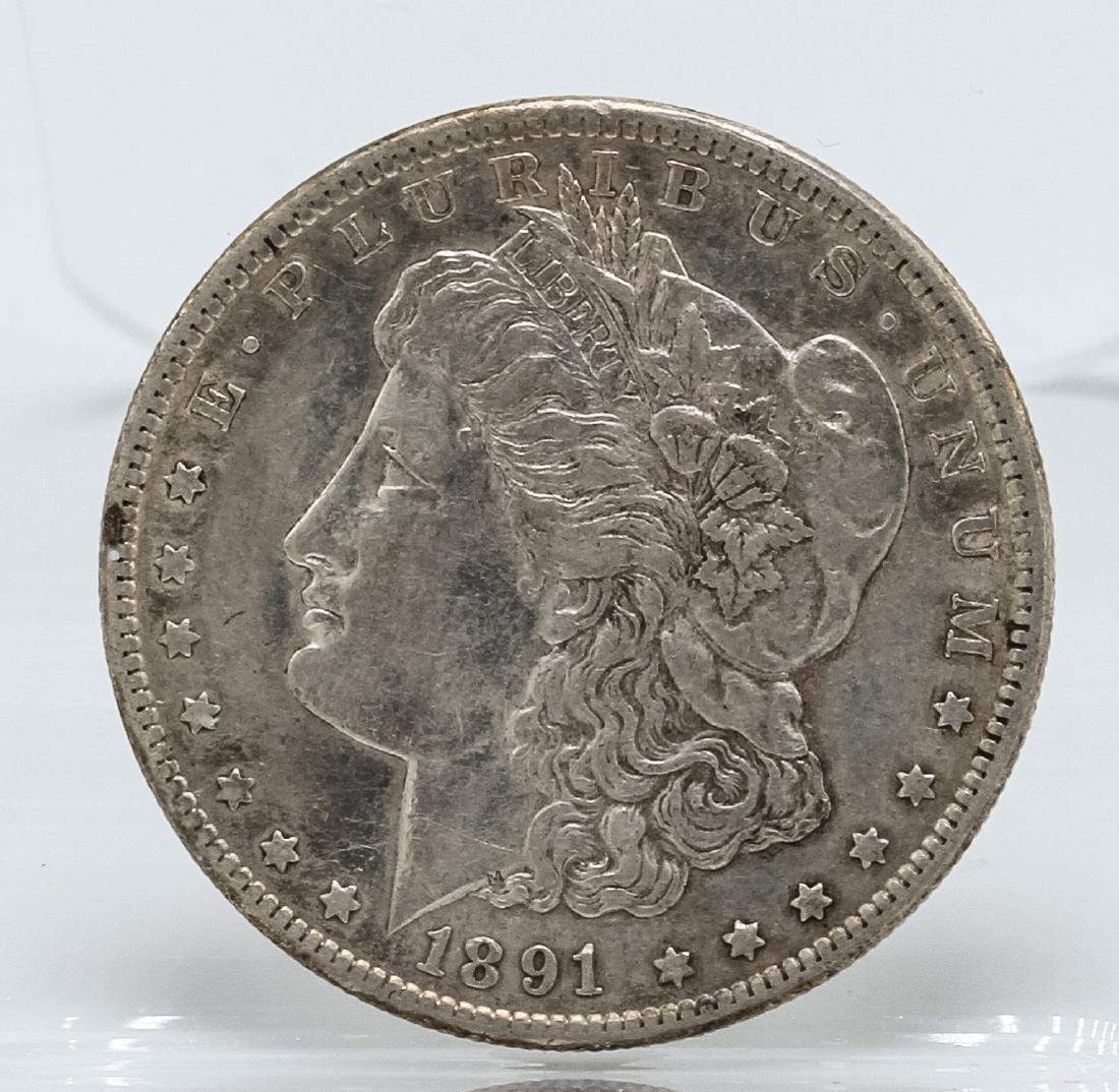 1891-CC $1 Morgan Silver Dollar Coin: One 1891-CC $1 Morgan Silver Dollar Coin.