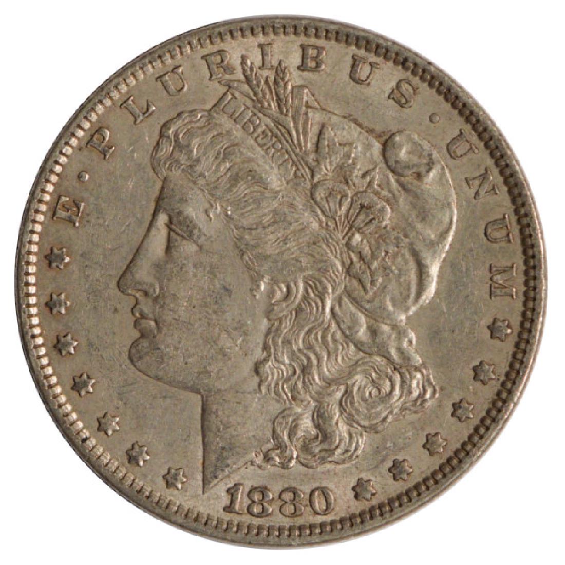 1880 $1 Morgan Silver Dollar Coin: One 1880 $1 Morgan Silver Dollar Coin.