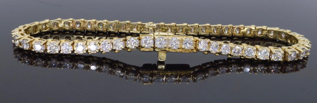 14KT Yellow Gold 3.50ctw Diamond Tennis Bracelet: One 14KT Yellow Gold 3.50ctw Diamond Tennis Bracelet. Round Diamonds with a total weight of 3.50ctw with a color of H-K and clarity of SI-2 to I-2. Length of this bracelet is 7 inches. Total weight of