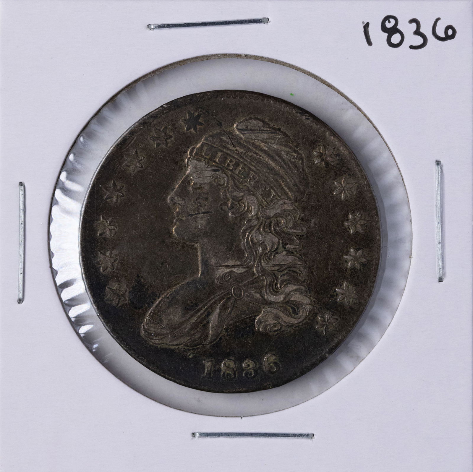 1836 Capped Bust Half Dollar Coin: One 1836 Capped Bust Half Dollar Coin.