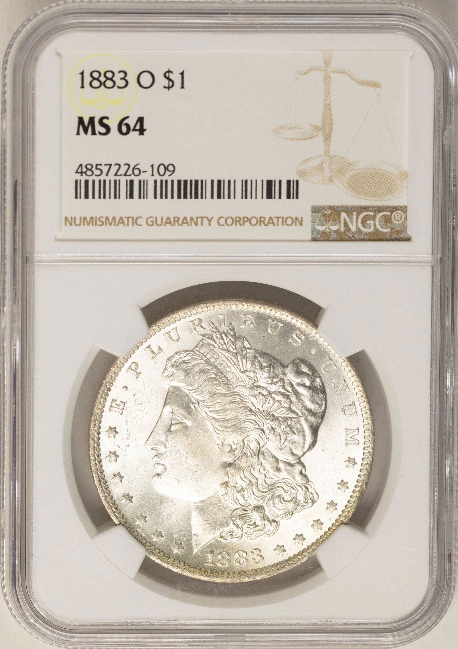 1883-O $1 Morgan Silver Dollar Coin NGC MS64: One 1883-O $1 Morgan Silver Dollar Coin NGC MS64.