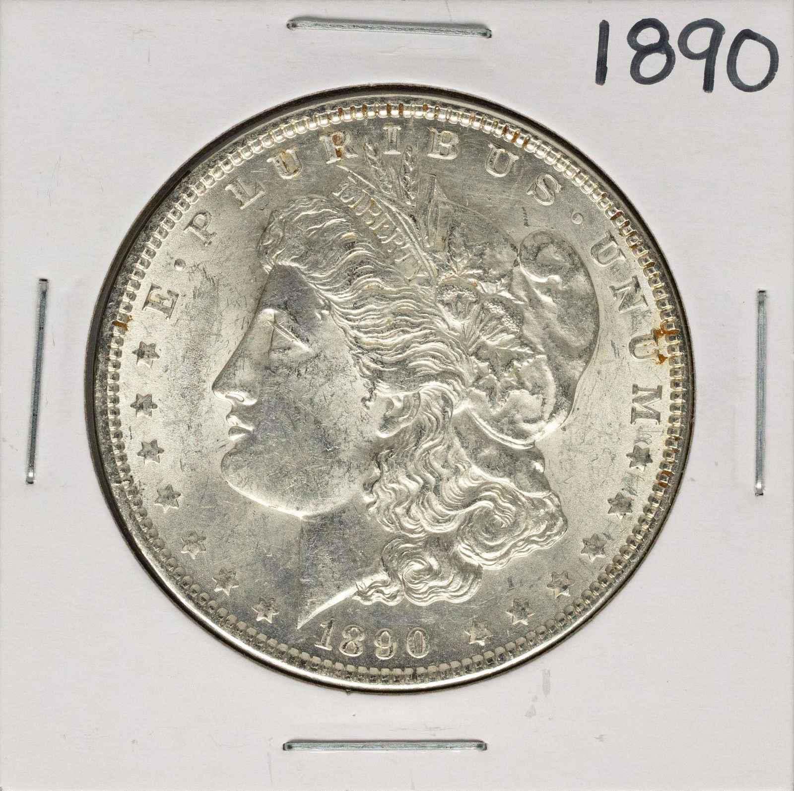 1890 $1 Morgan Silver Dollar Coin: One 1890 $1 Morgan Silver Dollar Coin.
