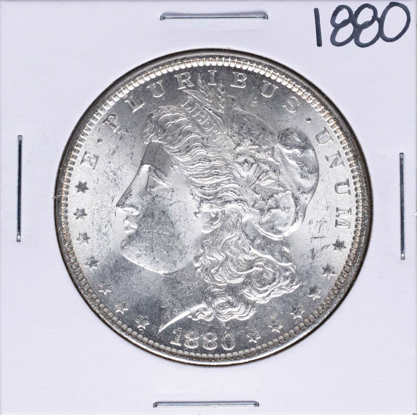 1880 $1 Morgan Silver Dollar Coin: One 1880 $1 Morgan Silver Dollar Coin.