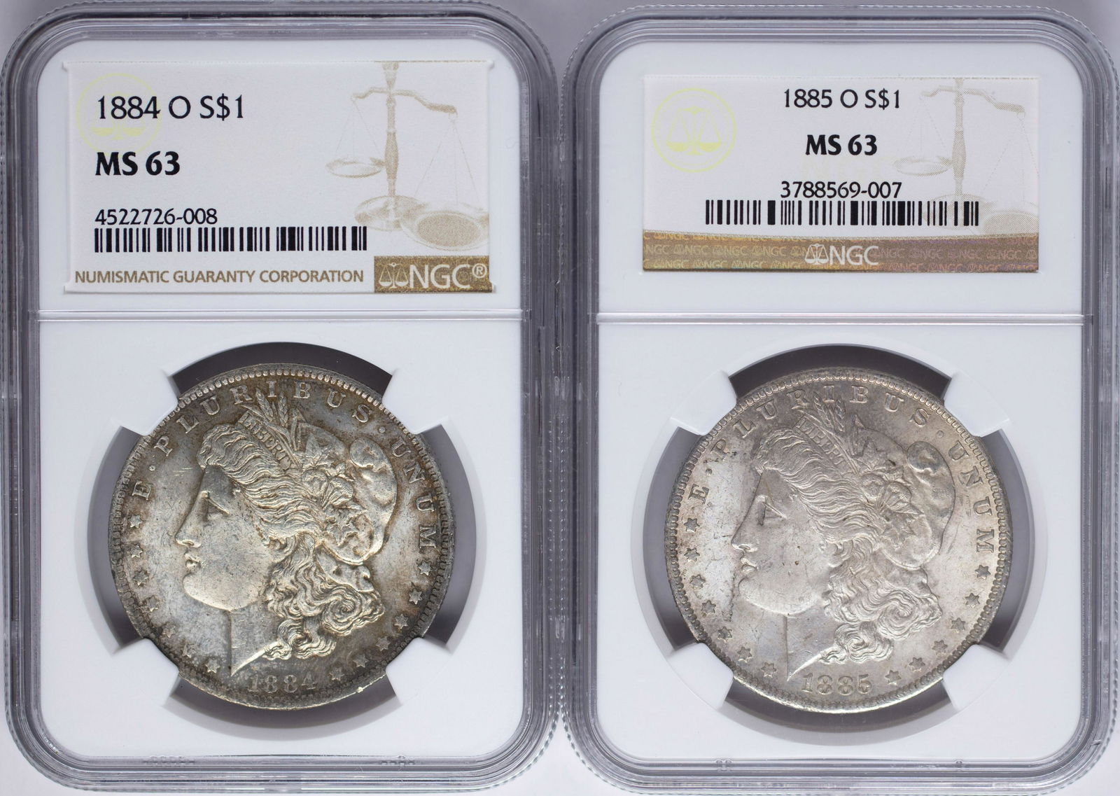 Lot of 1884-O & 1885-O $1 Morgan Silver Dollar Coins: One Lot of 1884-O & 1885-O $1 Morgan Silver Dollar Coins NGC MS63.