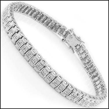 Plated Rhodium 0.43ctw Diamond Bracelet: One Plated Rhodium 0.43ctw Diamond Bracelet. (28) single cut round Diamonds with a color of I and clarity of SI2. 10.95 grams of brass layered with Rhodium.