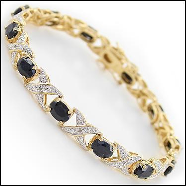 Plated 18KT Yellow Gold 12.45ctw Black Sapphire and: One Plated 18KT Yellow Gold 12.45ctw Black Sapphire and Diamond Bracelet. (12) Black Sapphire stones measuring 3.8mm. (6) diamonds measuring 1.0mm. 9.38 grams of brass layered with 18K yellow gold.