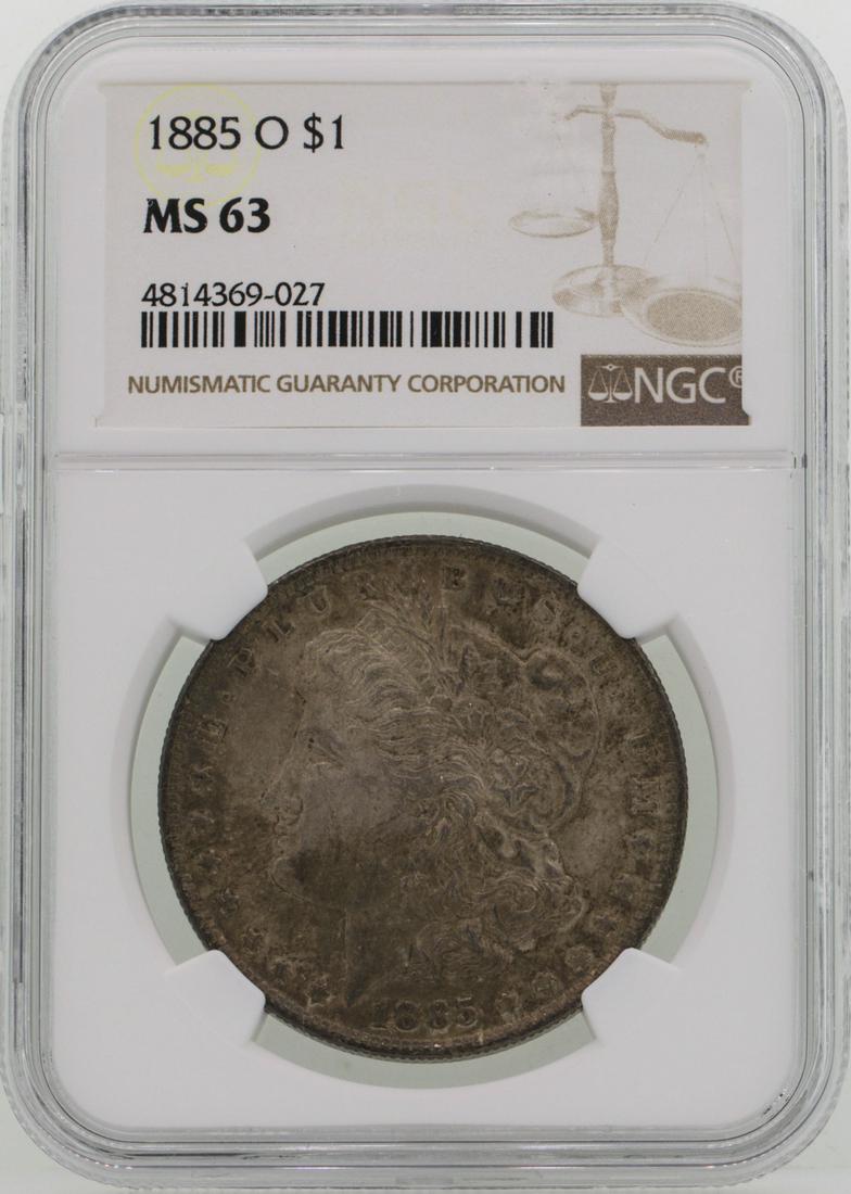 1885-O $1 Morgan Silver Dollar Coin NGC MS63: One 1885-O $1 Morgan Silver Dollar Coin NGC MS63.