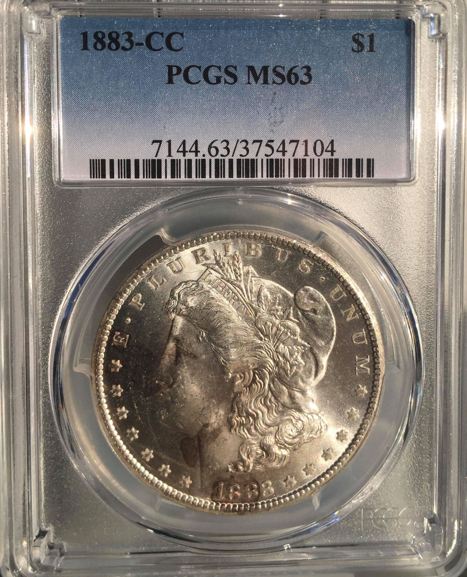 1883-CC $1 Morgan Silver Dollar Coin PCGS MS63: One 1883-CC $1 Morgan Silver Dollar Coin PCGS MS63.