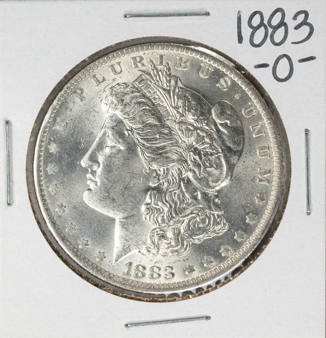1883-O $1 Morgan Silver Dollar Coin: One 1883-O $1 Morgan Silver Dollar Coin.