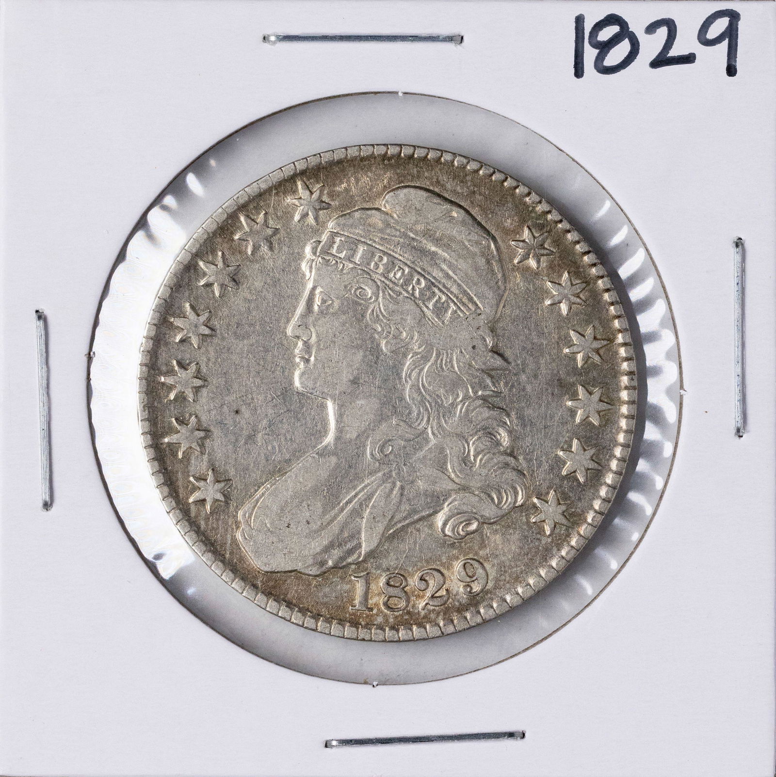 1829 Capped Bust Half Dollar Coin: One 1829 Capped Bust Half Dollar Coin.