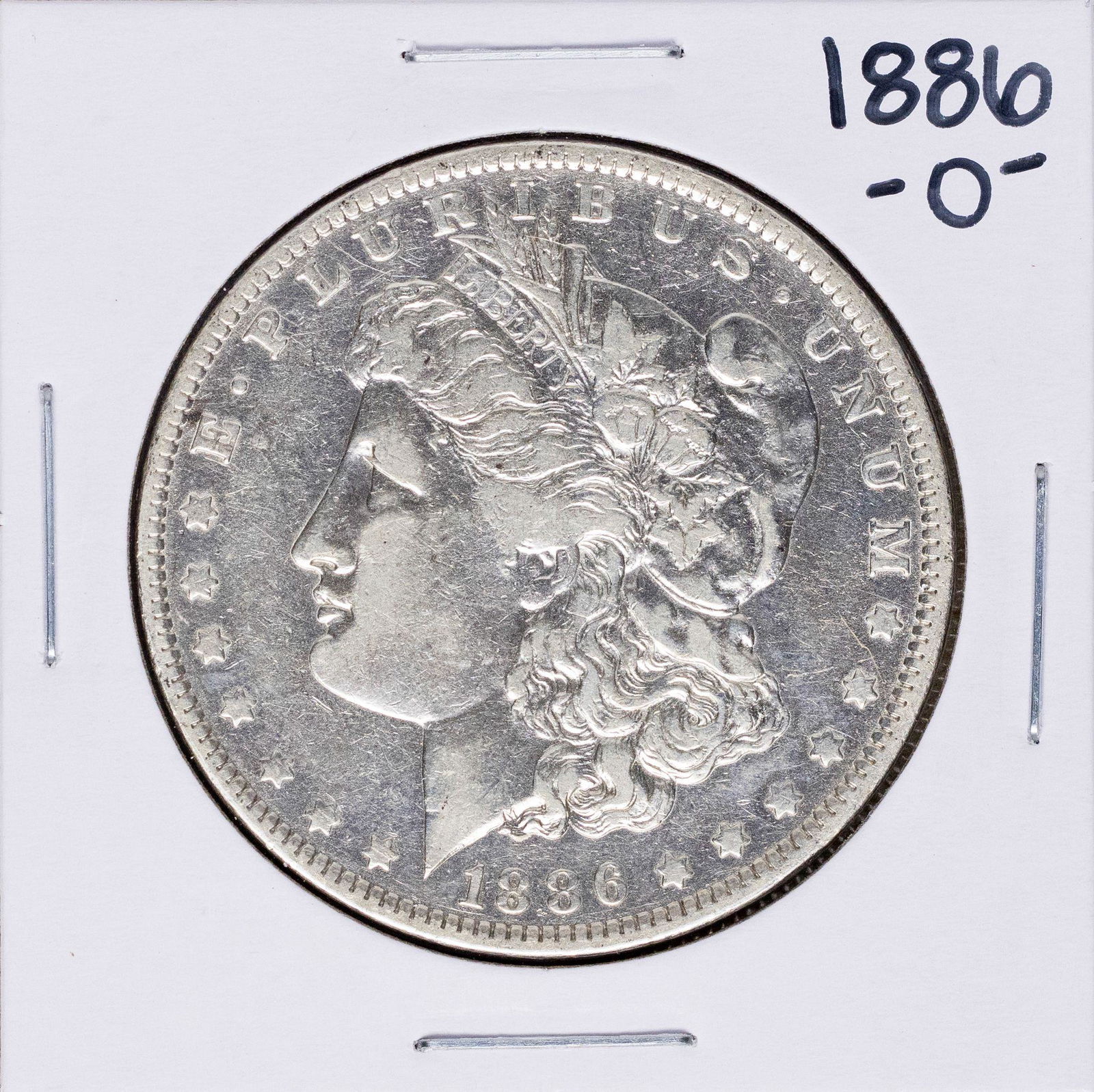 1886-O $1 Morgan Silver Dollar Coin: One 1886-O $1 Morgan Silver Dollar Coin.