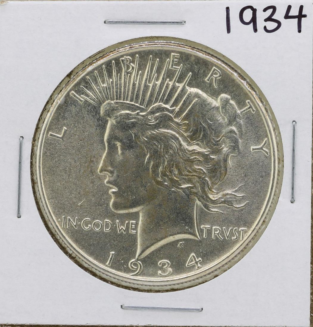 1934 $1 Peace Silver Dollar Coin: One 1934 $1 Peace Silver Dollar Coin.