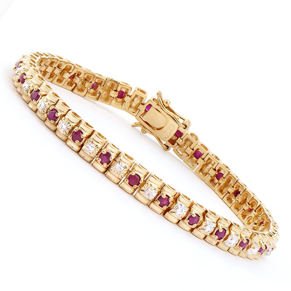 Plated 18KT Yellow Gold 2.50ctw Ruby and Diamond: One Plated 18KT Yellow Gold 2.50ctw Ruby and Diamond Bracelet. (27) Rubies with a total weight of 2.50cts. Diamonds with a total weight of 0.015cts with a color of I-J and clarity of I-3. Total weight