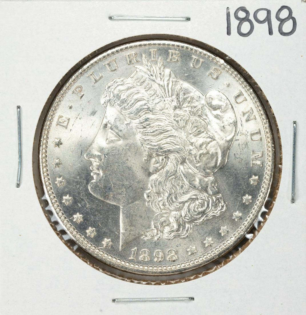 1898 $1 Morgan Silver Dollar Coin: One 1898 $1 Morgan Silver Dollar Coin.