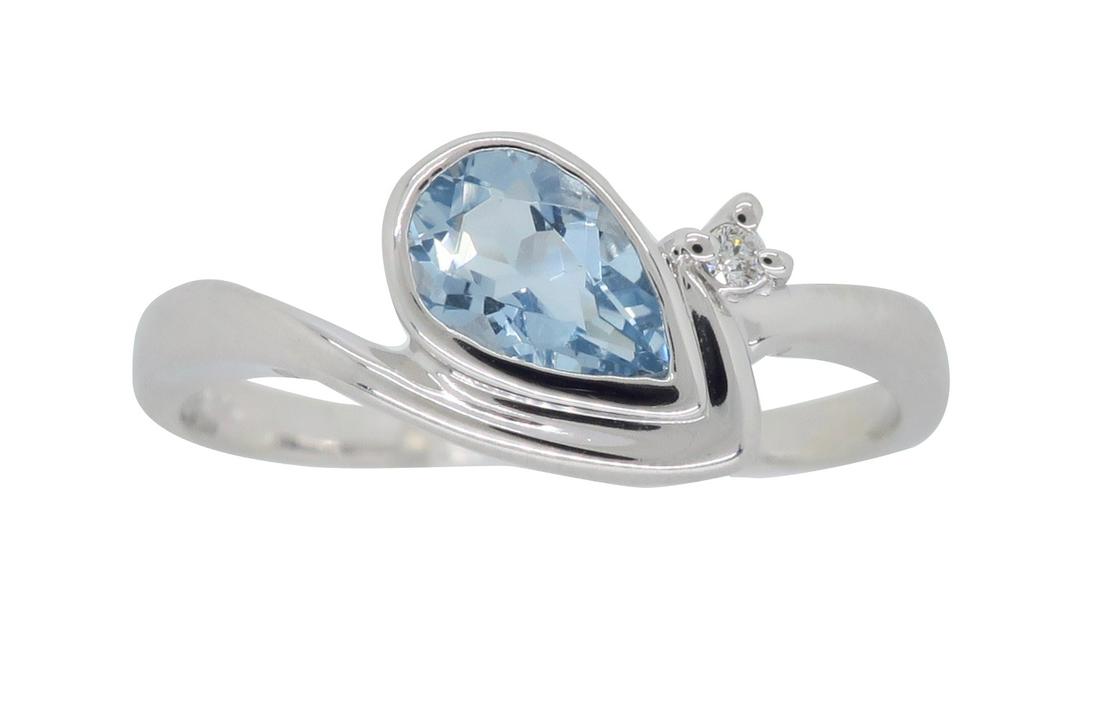 10KT White Gold Aquamarine and Diamond Ring: One 10KT White Gold Aquamarine and Diamond Ring. (1) pear shaped Aquamarine stone measuring 6 x 4mm. (1) round Diamond with a total weight of 0.01cts with a color of G-H and clarity of SI-2. Total wei