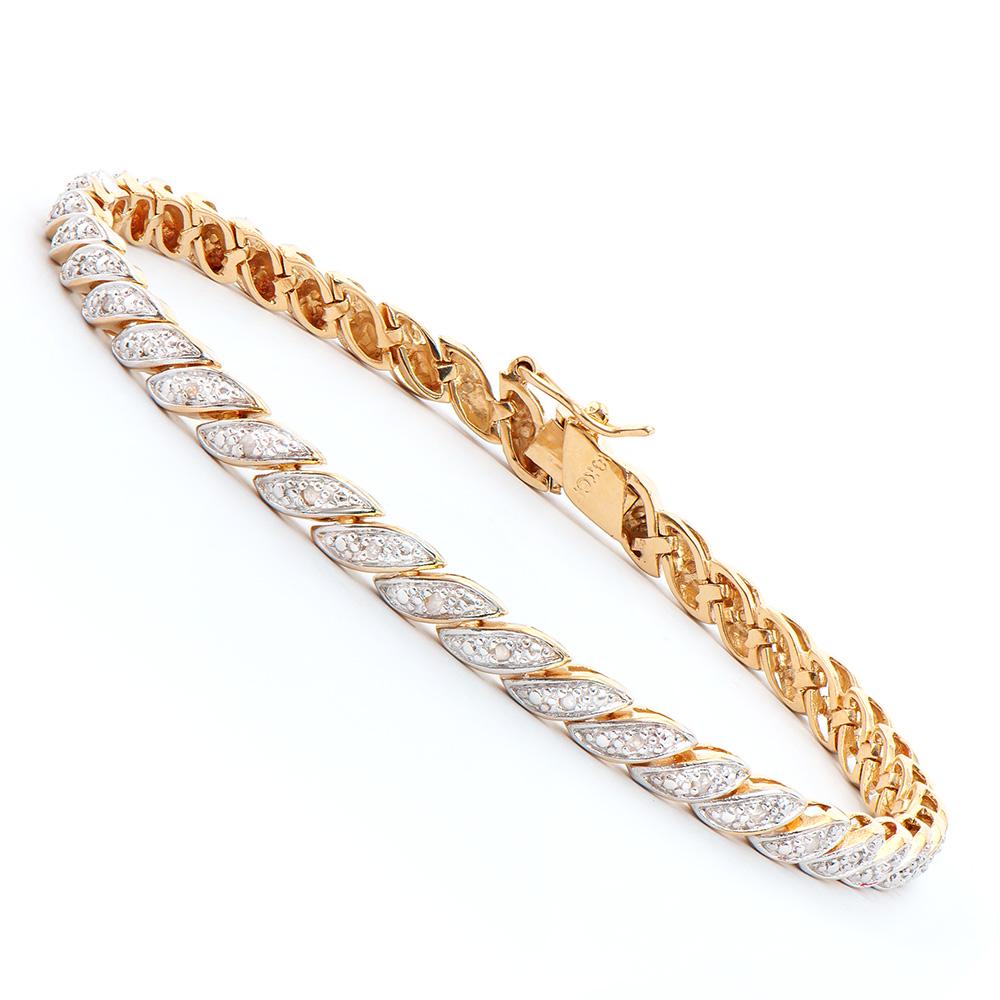 Plated 18KT Yellow Gold Diamond Bracelet: One Plated 18KT Yellow Gold Diamond Bracelet. Diamonds with a total weight of 0.015cts with a color of I-J and with a clarity of I3. Total weight of this bracelet is 9.05 grams of brass layered with 1