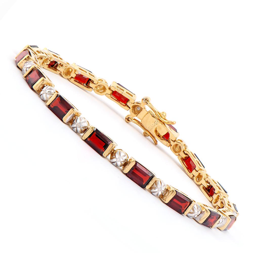 Plated 18KT Yellow Gold 10.00ctw Garnet and Diamond: One Plated 18KT Yellow Gold 10.00ctw Garnet and Diamond Bracelet. (16) Garnet stones measuring 6x4mm with a total weight of 10.00cts. (16) round Diamonds measuring 1.1mm with a color of I-J and a clar