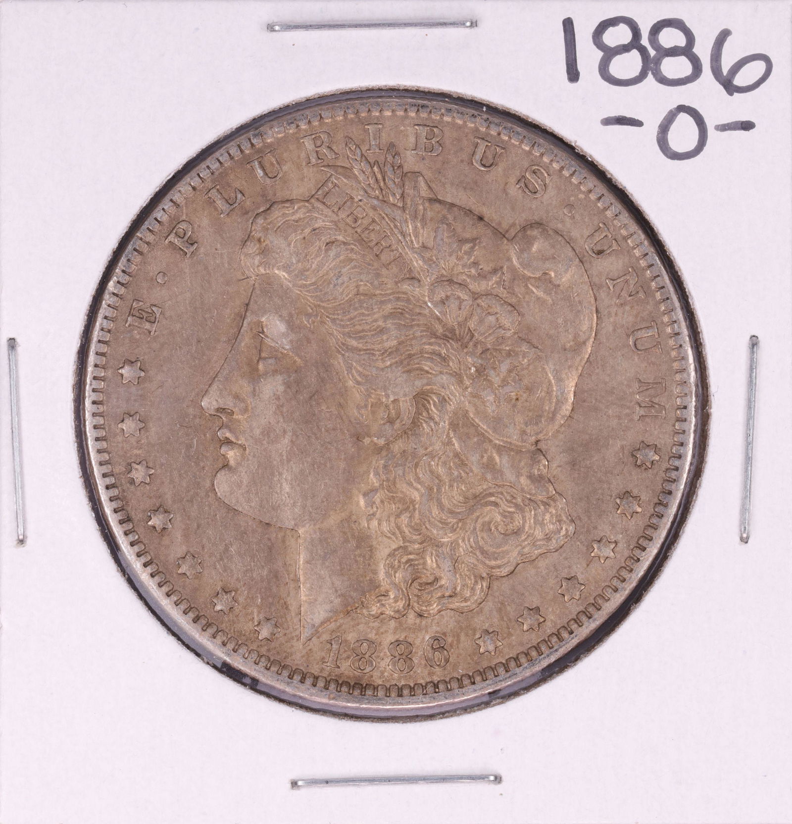 1886-O $1 Morgan Silver Dollar Coin: One 1886-O $1 Morgan Silver Dollar Coin.