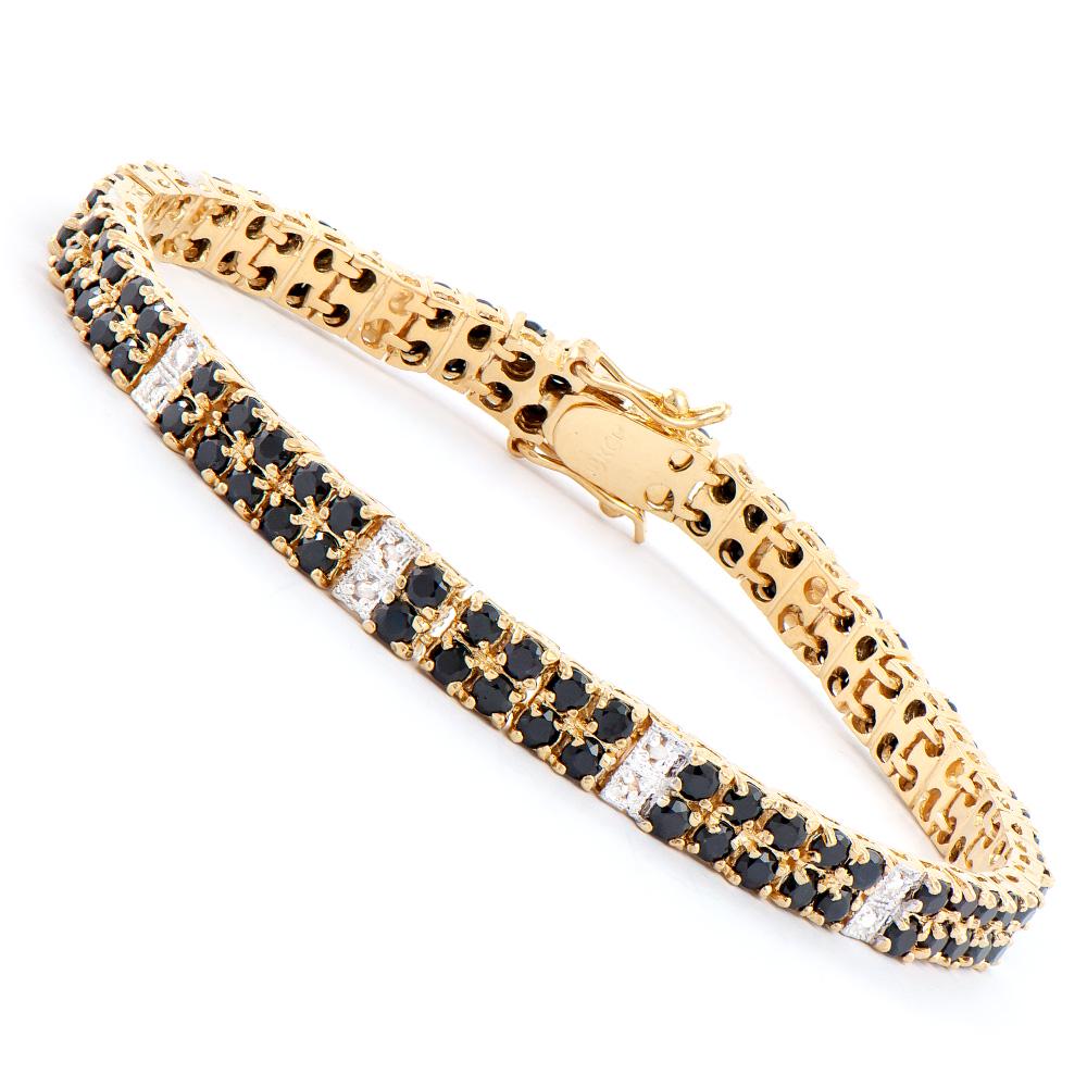 Plated 18KT Yellow Gold 9.15ctw Black Sapphire and: One Plated 18KT Yellow Gold 9.15ctw Black Sapphire and Diamond Bracelet. (108) Black Sapphires measuring 2.5mm with a total weight of 9.15cts. Round Diamonds measuring 1.1mm with I3 clarity and a colo