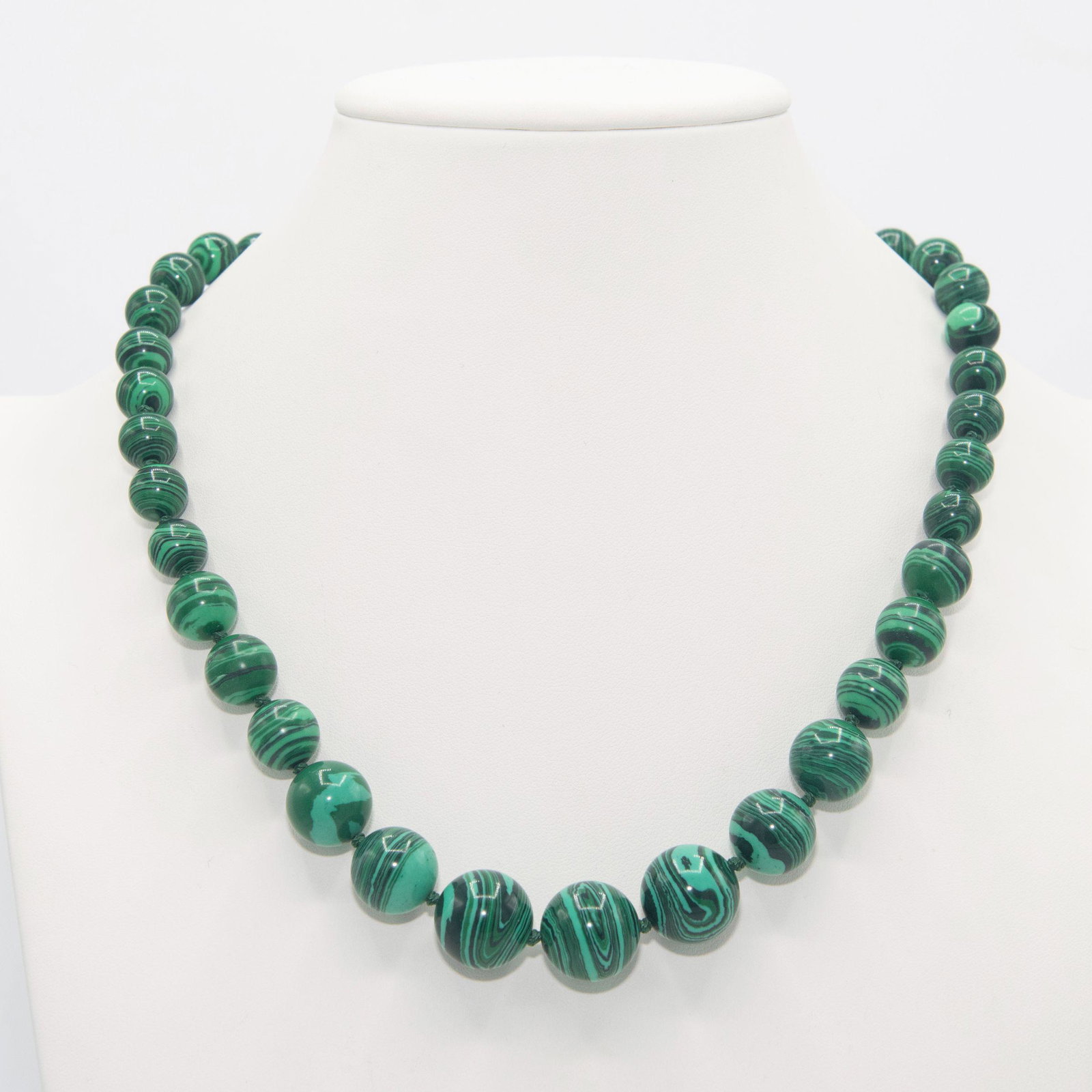 Breathtaking 348.5 Ct Natural Malachite Necklace: Breathtaking 348.5 Ct Natural Malachite Necklace. This graduating bead necklace features highly polished round beads ranging from 10 mm. to 16mm. 20 " long. 348.5 cttw or 69.7 total grams.