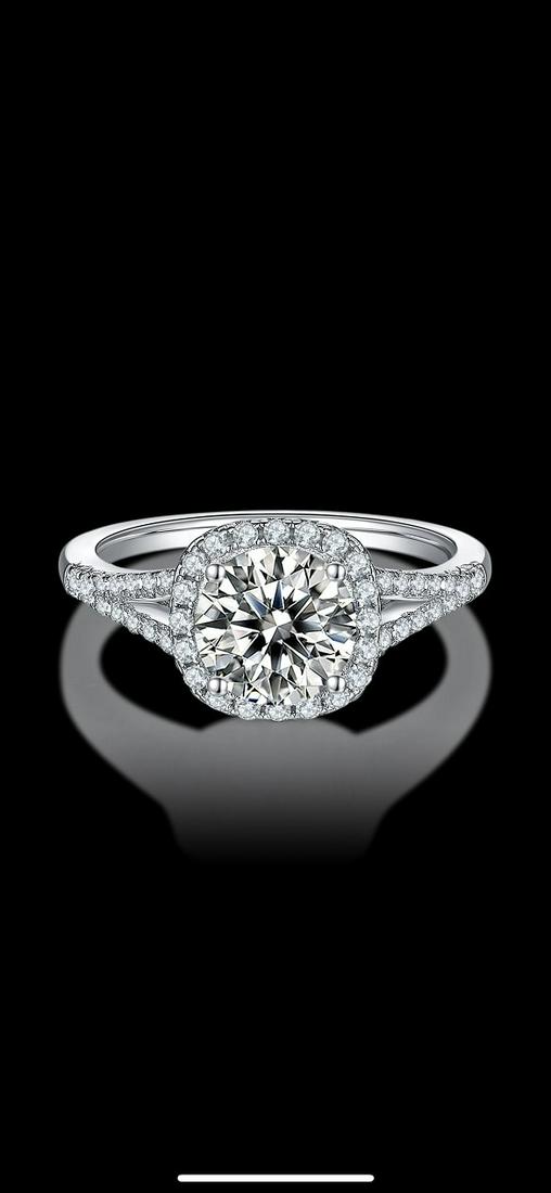 Sparkling 3 Ct VVS1 White F-G Fire Moissanite Ring: This Fire Moissanite is a VVS1 Brilliant Round Cut. The Color is F-G with a clarity of VVS-1. Measuring approx. 9 mm. This Fire Moissanite is near flawless and bursting out with a full spectrum of col