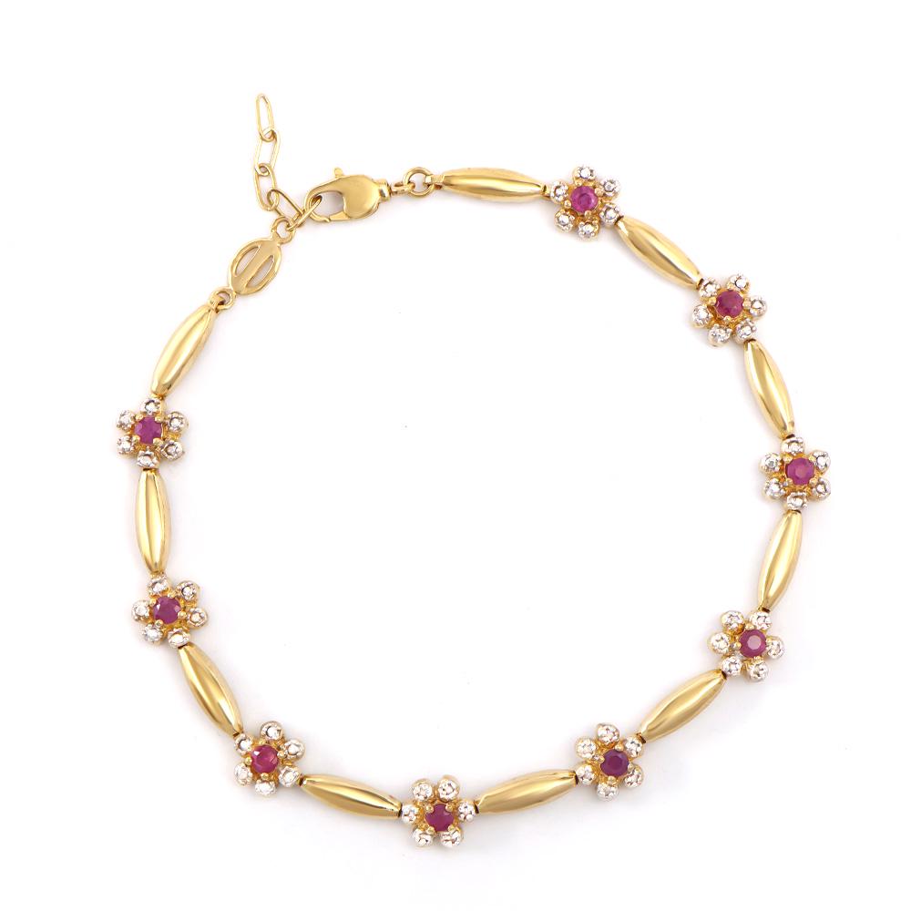 Plated 18KT Yellow Gold 1.25ctw Ruby and Diamond Bracelet: One Plated 18KT Yellow Gold 1.25ctw Ruby and Diamond Bracelet. (9) Rubies with a total weight of 1.25cts. Diamonds with a total weight of 0.13cts with a color of I-J and clarity of I-3. Total weight o