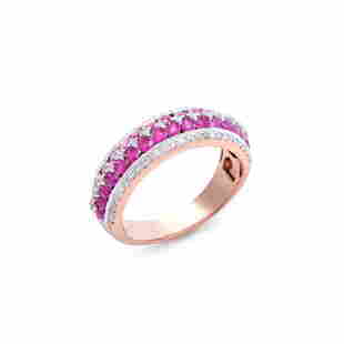 14KT Rose Gold 1.56ctw Ruby and Diamond Diamond Ring: (32) Rubies with a total weight of 1.25cts. (69) Round Diamonds with a total weight of 0.31cts with a color of H-I and a clarity of I2-I3. Total weight of this ring is 5.50 grams. Ring size is 7.5.