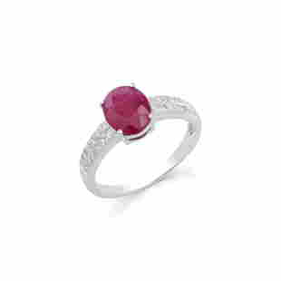 14KT White Gold 2.05ct Ruby and Diamond Ring: (1) Ruby with a total weight of 2.05cts. (24) round Diamonds with a total weight of 0.20cts with a color of H-I and clarity of I1-I2. Total weight of the ring is 2.10 grams. Ring size 7.5.