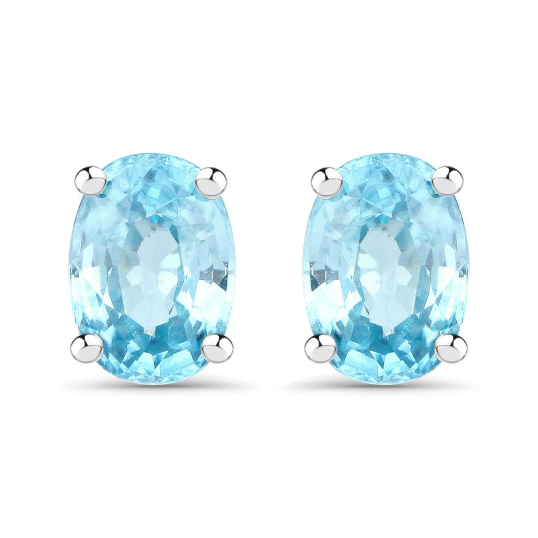 Plated Rhodium 2.40ctw Blue Zircon Earrings: 2.40 Carat Genuine Blue Zircon .925 Sterling Silver Earrings. Blue Zircon Oval/7x5mm - 2/2.40 ctw. Total weight 1.78 grams.