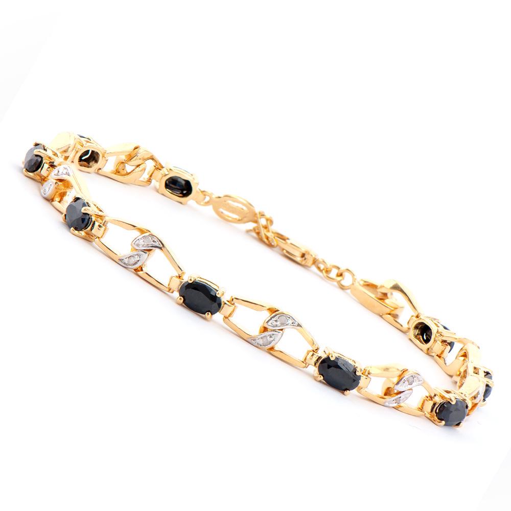 Plated 18KT Yellow Gold 6.50ctw Black Sapphire and Diamond Bracelet: One Plated 18KT Yellow Gold 6.50ctw Black Sapphire and Diamond Bracelet. (9) Black Sapphire stones with a total weight of 6.50cts. (6) Diamonds with a total weight of 0.04cts with a color of I-J and c
