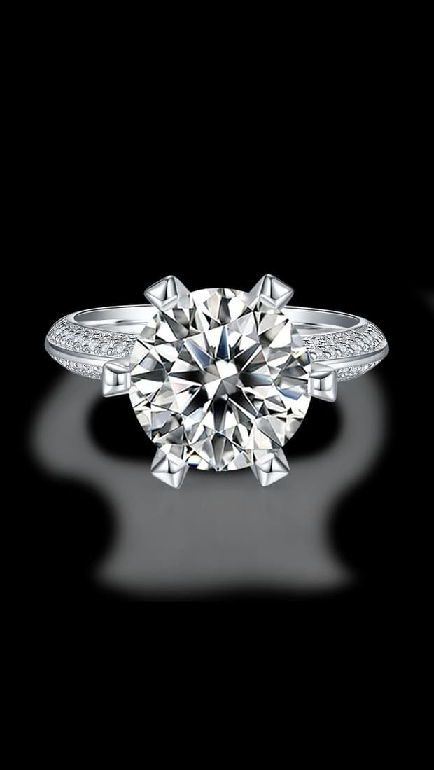 Sparkling 5 Ct VVS1 White F-G Fire Moissanite Ring: This Fire Moissanite is a VVS1 Brilliant Round Cut. The Color is F-G with a clarity of VVS-1. Measuring approx.10.5 mm. This Fire Moissanite is near flawless and bursting out with a full spectrum of c