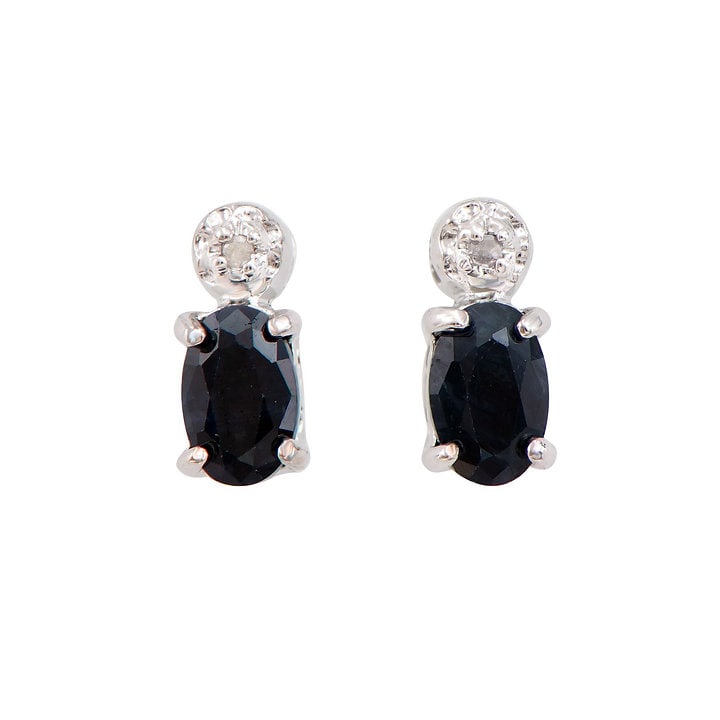 Plated Rhodium 1.32ctw Black Sapphire and Diamond Earrings: One pair of Plated Rhodium 1.32ctw Black Sapphire and Diamond Earrings. (2) black Sapphires with a total weight of 1.32cts. (2) diamonds with a total of 0.02cts with a color of H-I and clarity of I-3.