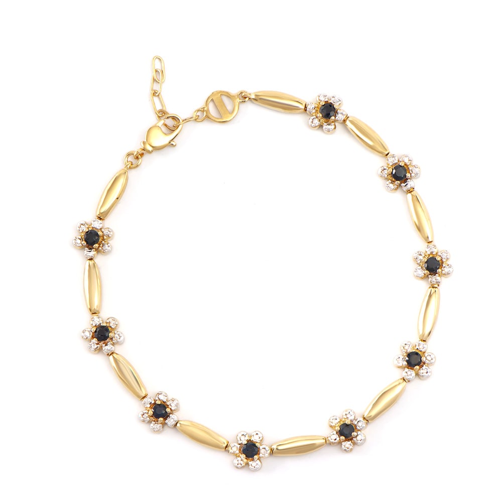 Plated 18KT Yellow Gold 1.25ctw Black Sapphire and Diamond Bracelet: One Plated 18KT Yellow Gold 1.25ctw Black Sapphire and Diamond Bracelet. (9) Black Sapphires with a total weight of 1.25cts. Diamonds with a total weight of 0.13cts with a color of I-J and clarity of 