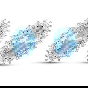 14KT White Gold 1.92ctw Aquamarine and Diamond Earrings: (2) Aquamarine stones with a total weight of 1.92cts. (40) Diamonds with a 0.26cts. Aquamarine (AA+) Oval 8x6mm - 2Pcs + White Diamond F/C Round 1.10mm - 40Pcs (I1-I2/I color). Total weight of these e
