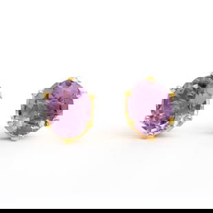 Plated 18KT Yellow Gold 4.25ctw Amethyst Earrings: One pair of Plated 18KT Yellow Gold 4.25ctw Amethyst and Diamond Earrings. (2) Amethyst stones with a total weight of 4.25cts. 1.85 grams of brass layered with 18K yellow gold.
