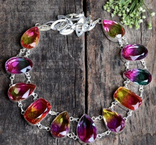 Amazing Lab Created Watermelon Tourmaline Necklace: These lab created gemstones are faceted mixed cuts. VVS1 eye clean. Mounted in .925 Sterling Silver Overlay.18" long.98.5 Total Grams or 494.5 Cttw. Get Ready For The Compliments On This One.