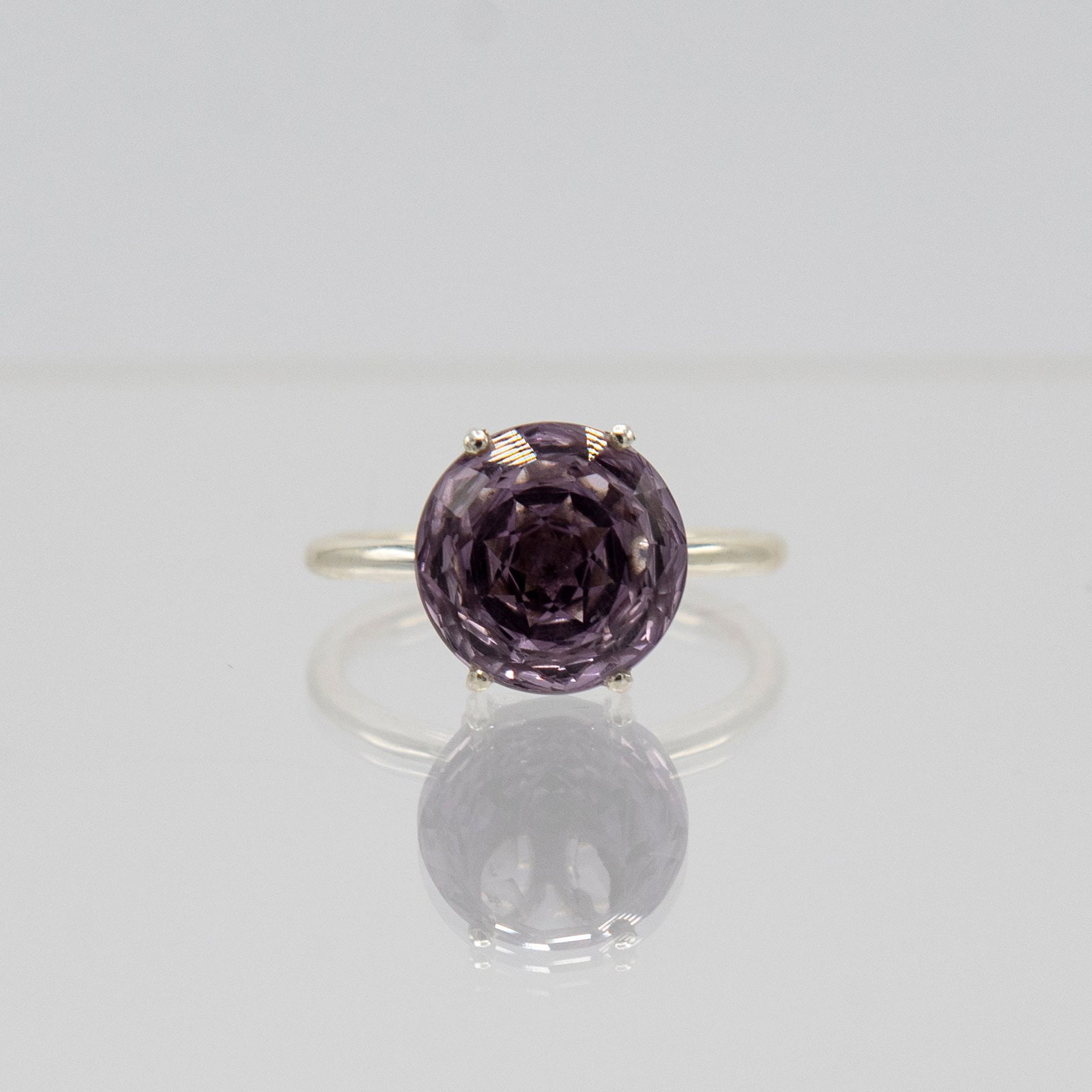 Natural 7.75 Ct Untreated Purple Amethyst Ring: Natural 7.75 Ct Untreated Purple Amethyst Ring. Hand Carved Rose Cut Measuring 12 X 12 Mm. Eye Clean .Mounted In Solid .925 Sterling Silver. Size 8 1/2. Total Gram Weight Is 3.7 Grams.