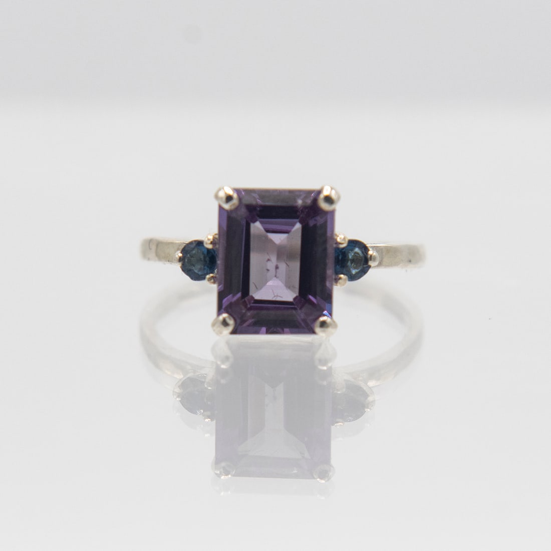Lab Created Breathtaking 5.2 Ct Russian Alexandrite Ring: Breathtaking 5.2 Ct Russian Alexandrite Ring. This lab grown alexandrite is near flawless and has the same chemical make up as a mined from the earth natural alexandrite would have. The chemical compo