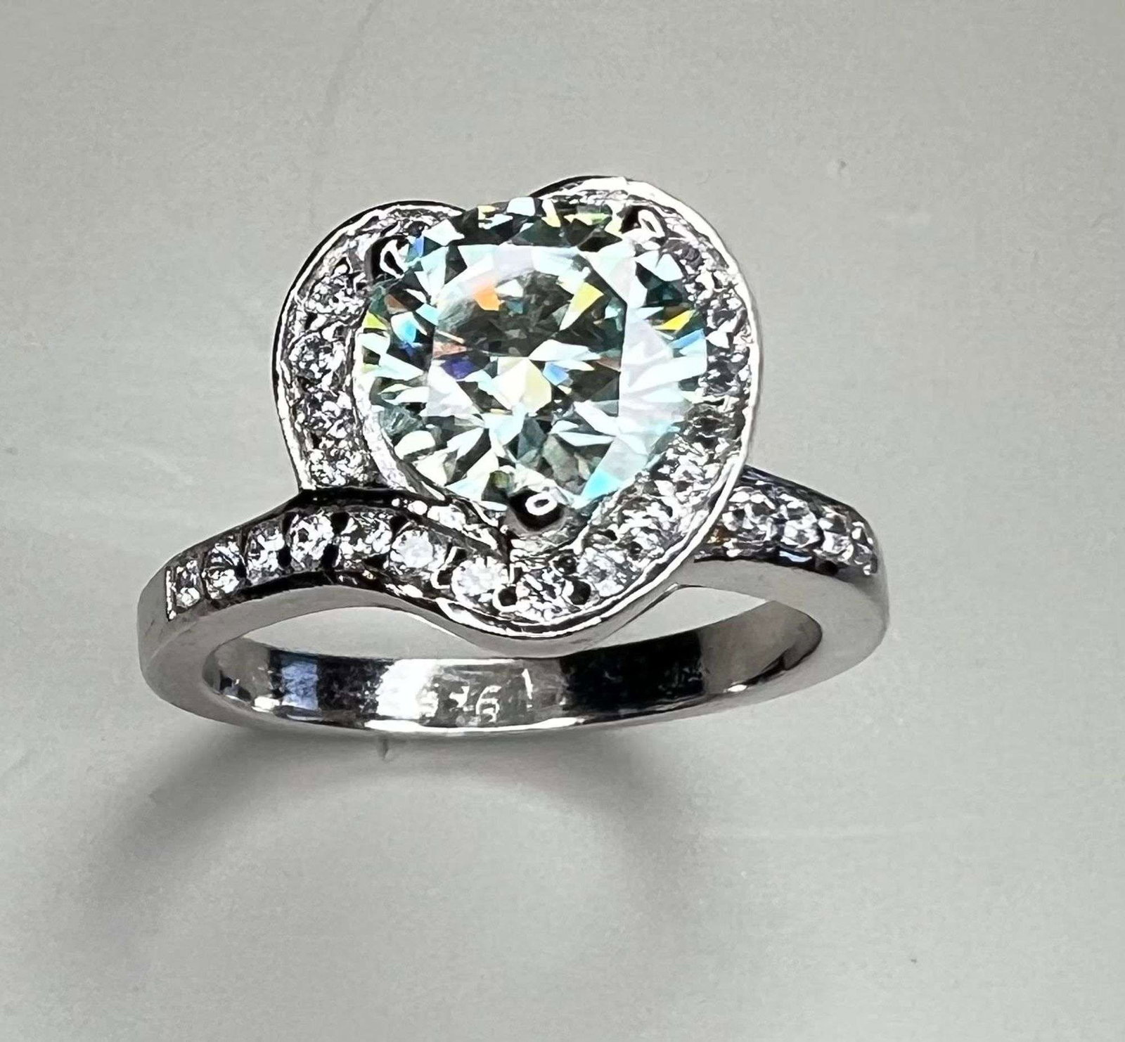 Beautiful 3 Ct Green Fire Moissanite Heart Ring: Sparkling 3 Ct Mint Green Fire Moissanite Ring. This VVs1 Moissanite Center Stone Is Eye Clean. It will test positive for a diamond on almost every single diamond tester. The Center Stone In This Hear