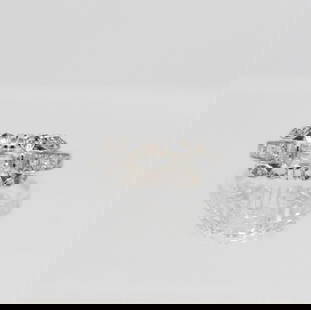 Beautiful1 Ct VVs1 Fire Moissanite Ring: Beautiful 1 Ct Fire Moissanite Ring. It is VVs1 eye clean emerald bursting out with a full spectrum of colors. This Moissanite is Mounted in .925 solid sterling silver with 14 Kt White Gold Plate, whi
