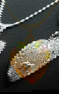 Sterling Silver Mom Heart Locket Necklace: Sterling Silver Mom Heart Locket Necklace. Featuring 14 kt gold plated heart highlights. Includes " necklace.